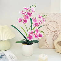 Orchidée papillon artificielle en pot