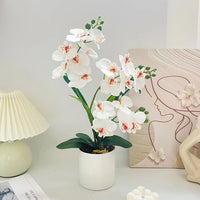 Orchidée papillon artificielle en pot